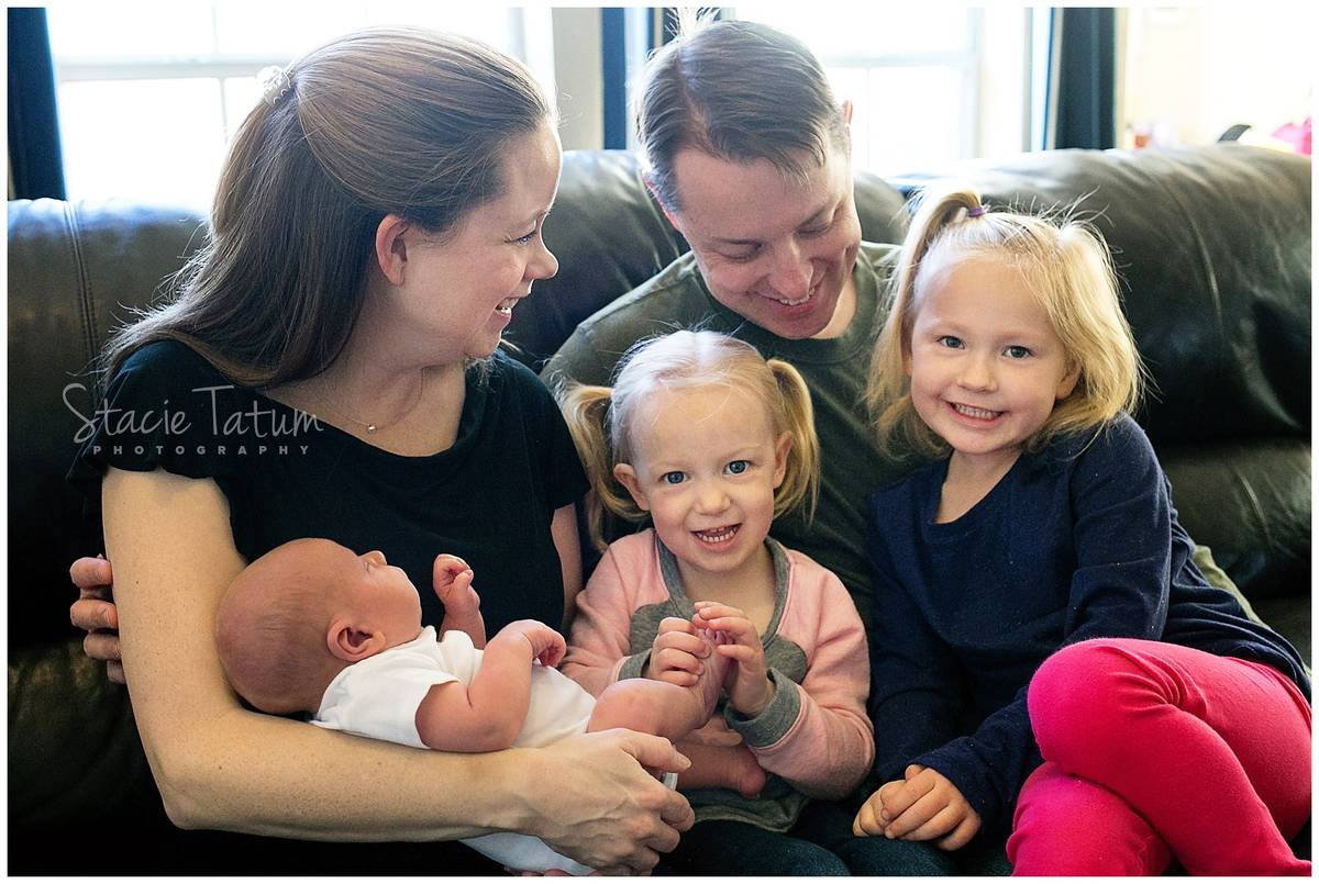 Newborn photos with three kids